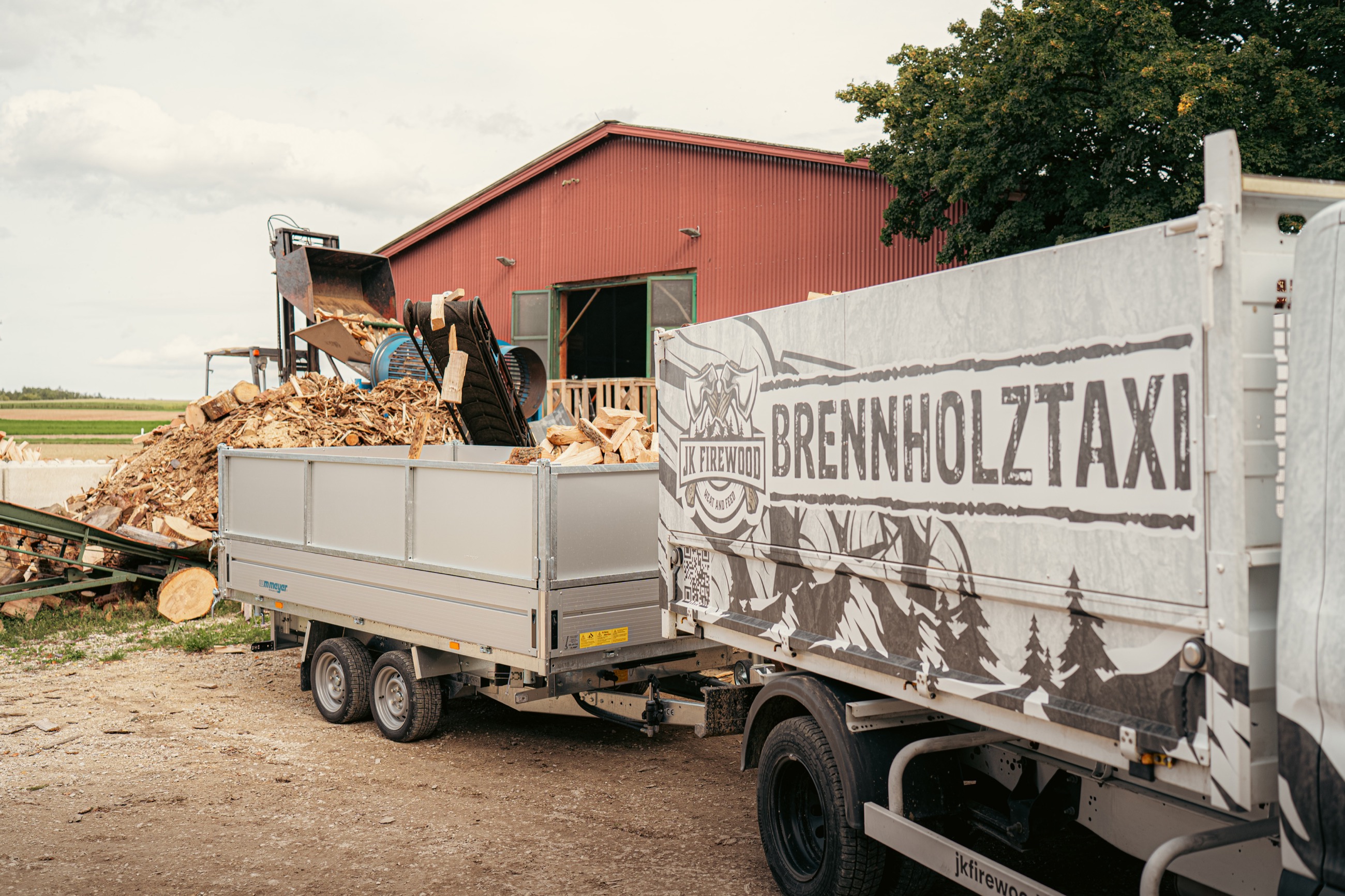 Brennholzlieferung im Container